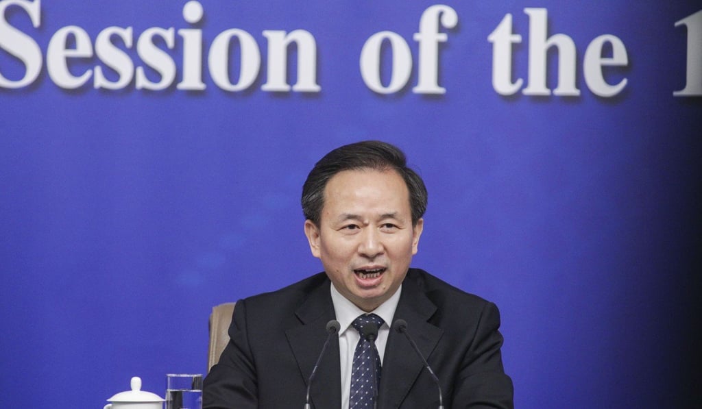 China’s Minister of Environmental Protection Li Ganjie speaks to the media at the first session of the 13th National People’s Congress in Beijing on March 17. Photo: Simon Song