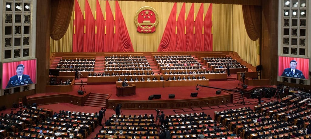 Chinese President Xi Jinping (at the podium) delivers a speech during the closing session of the National People's Congress at the Great Hall of the People in Beijing on Tuesday. Photo: AFP Chinese President Xi Jinping (at the podium) delivers a speech during the closing session of the National People's Congress at the Great Hall of the People in Beijing on Tuesday. Photo: AFP