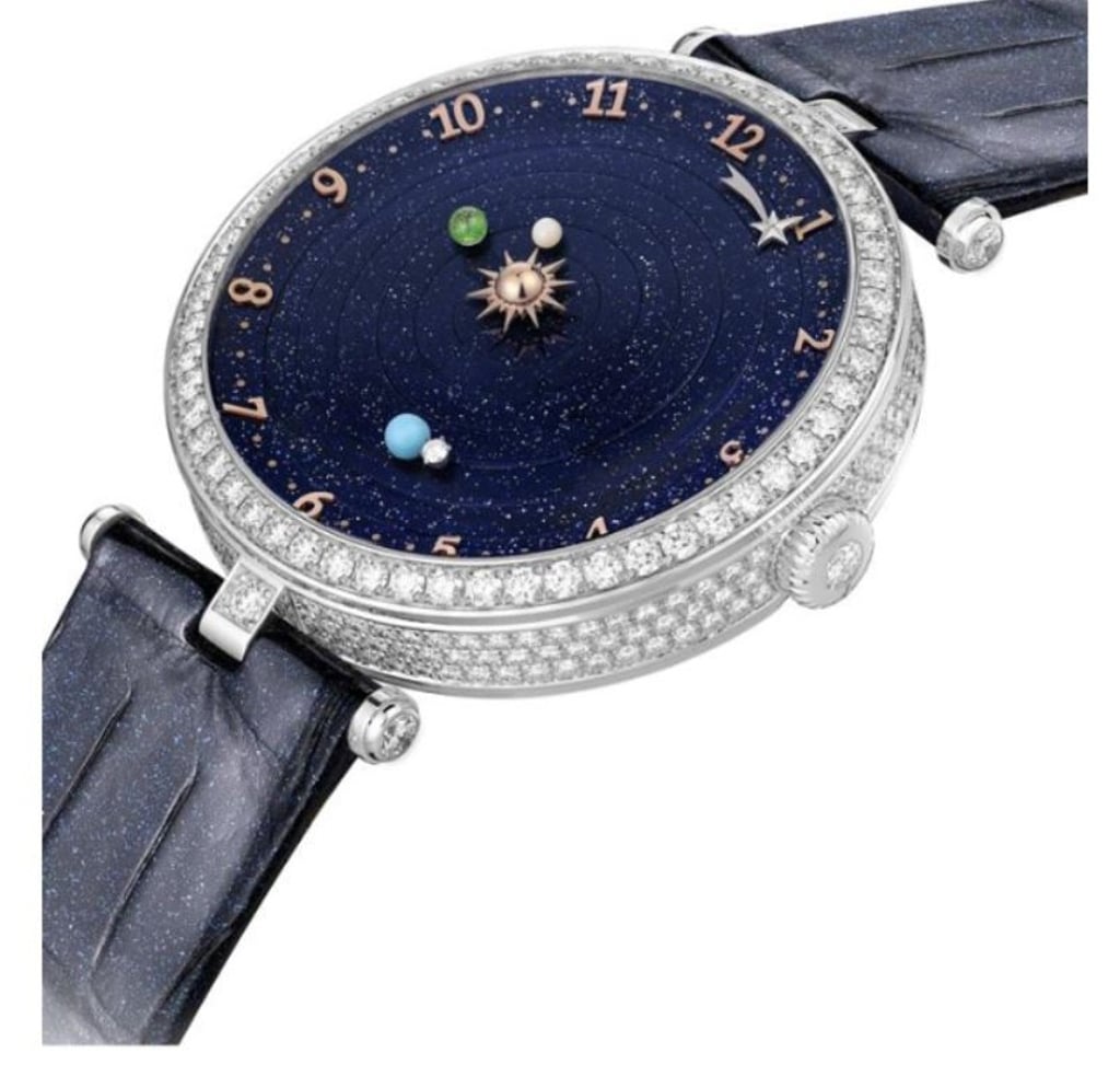 Van cleef et arpels montre planetarium prix on sale