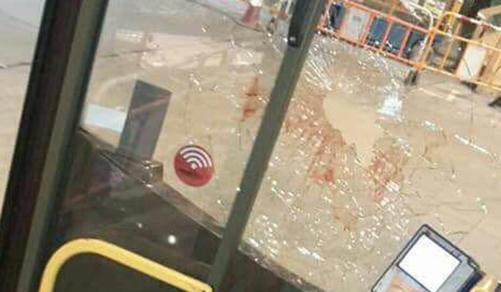 The blood-smeared bus window. Photo: Facebook
