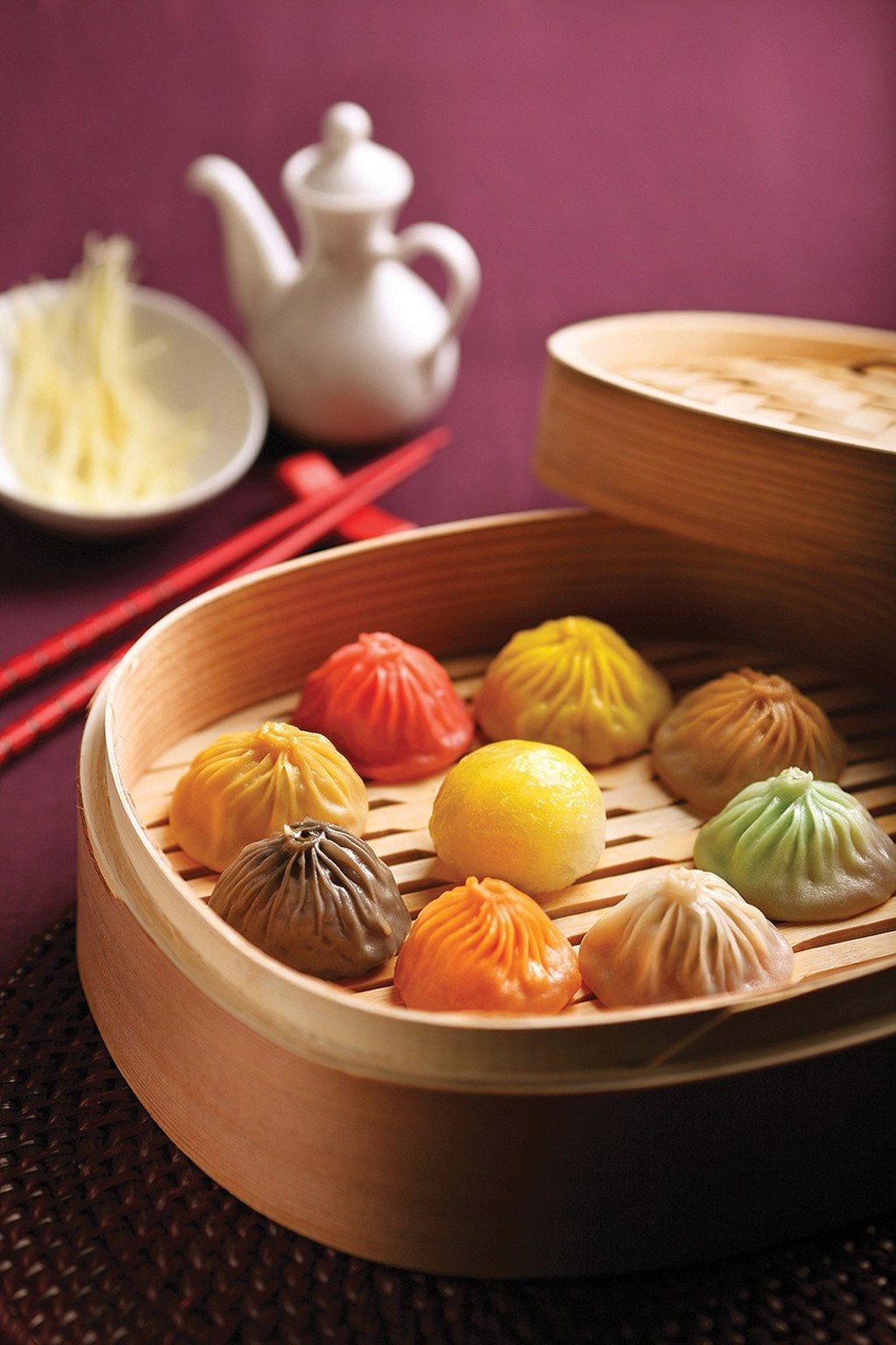 A selection of different flavours of xiaolongbao served at Crystal Jade La Mian Xiao Long Bao: traditional pork; pork and black truffle; spicy chicken; pork and foie gras; spicy beef; shrimp; and pork and fresh beans
