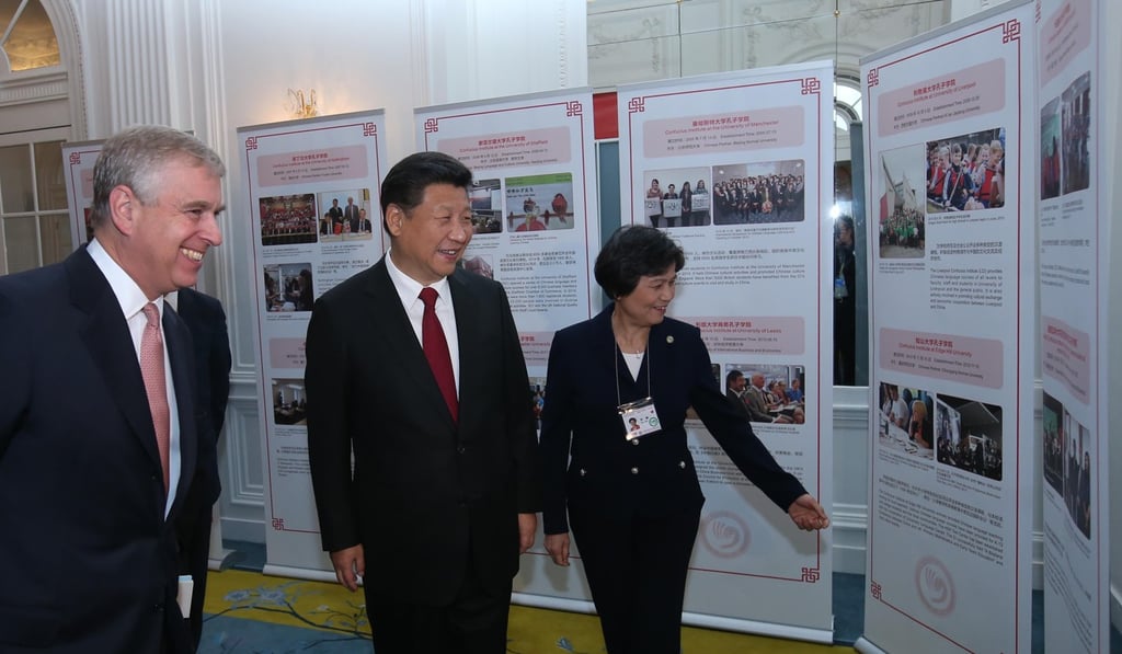 President Xi Jinping visits a photo exhibition at the opening of a conference of British Confucius Institutes and Confucius Classrooms in London. Photo: Xinhua