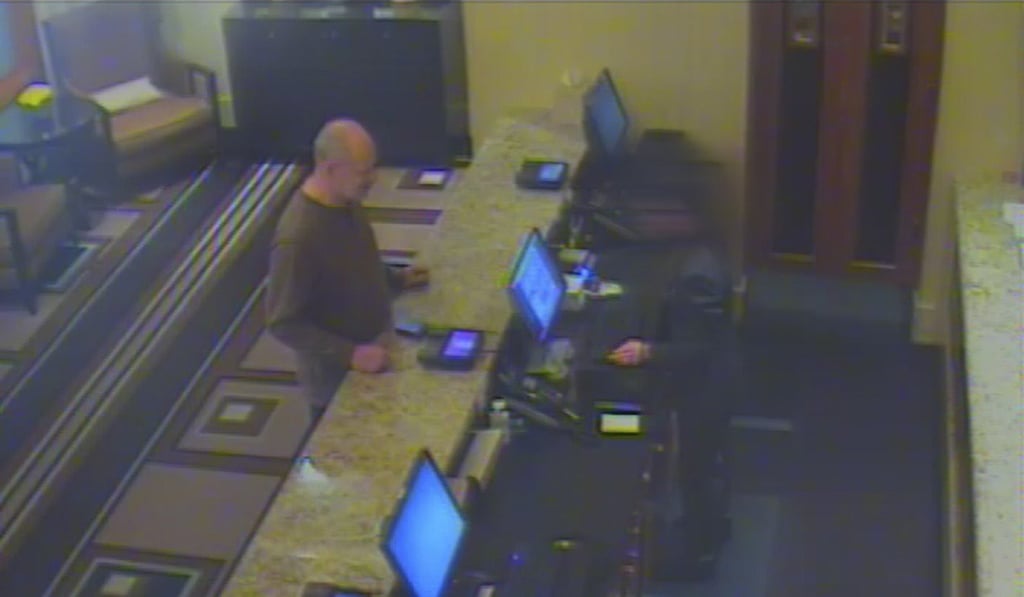 In this September 25, 2017, security camera image released by MGM Resorts, Stephen Paddock is shown at the VIP counter checking into the Mandalay Bay hotel in Las Vegas. Photo: AP