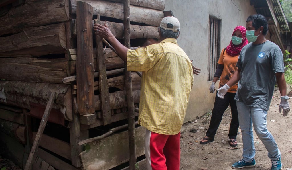 One of the wooden cages. Photo: AFP One of the wooden cages. Photo: AFP