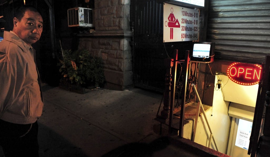 A sign for a massage parlour in New York. Photo: Alamy