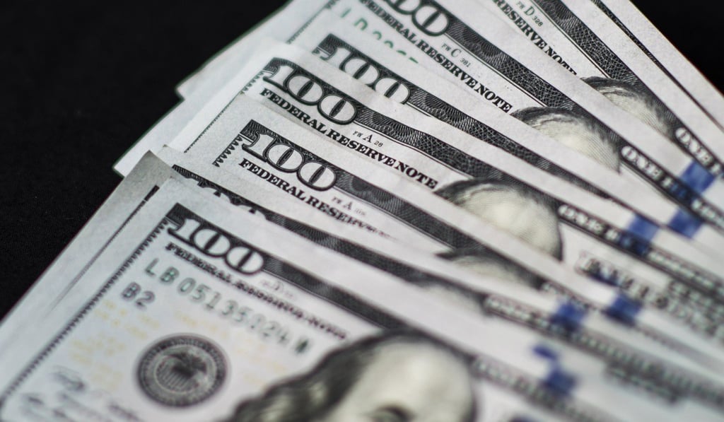 Since 1972 the local currency has been pegged to the US dollar. Photo: Bloomberg