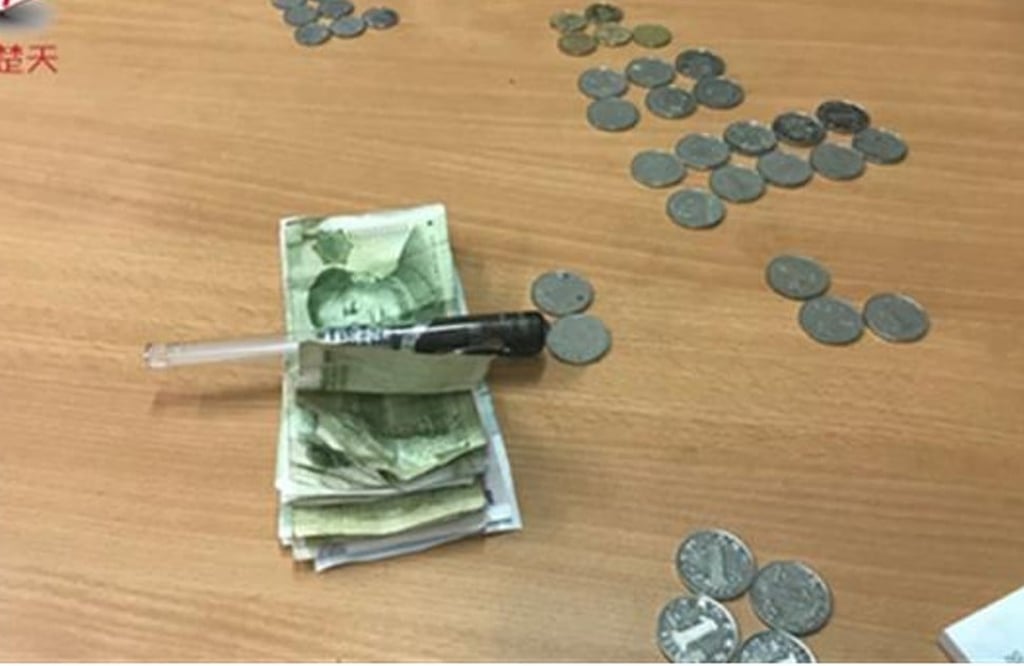 A beggar in Wuhan said he usually made between 300 and 400 yuan a day. Photo: Qq.com A beggar in Wuhan said he usually made between 300 and 400 yuan a day. Photo: Qq.com