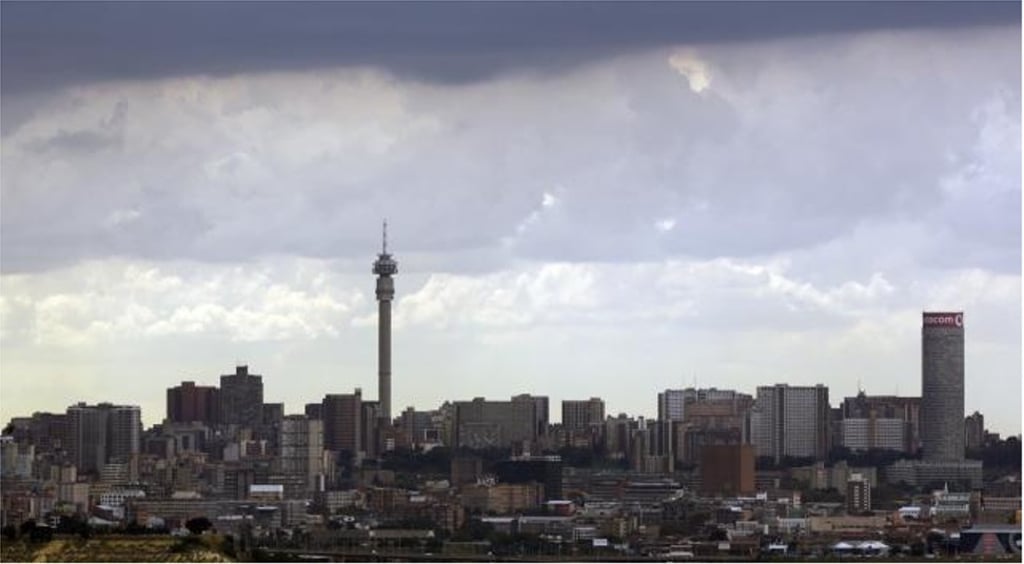 Johannesburg's skyline is shown under the clouds in South Africa. Photo: AP Johannesburg's skyline is shown under the clouds in South Africa. Photo: AP