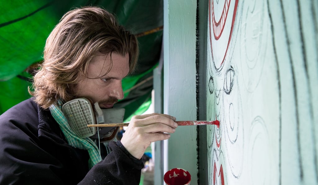 French street artist Julien Malland, aka Seth, at work.