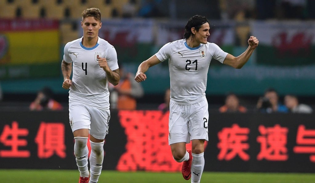 Uruguay’s Edinson Cavani (right) was one of the tournament’s big guns who didn’t disappoint. Photo: AFP