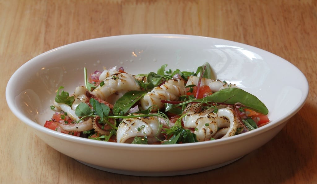 Sauté squid with salsa verde. Photo: Roy Issa