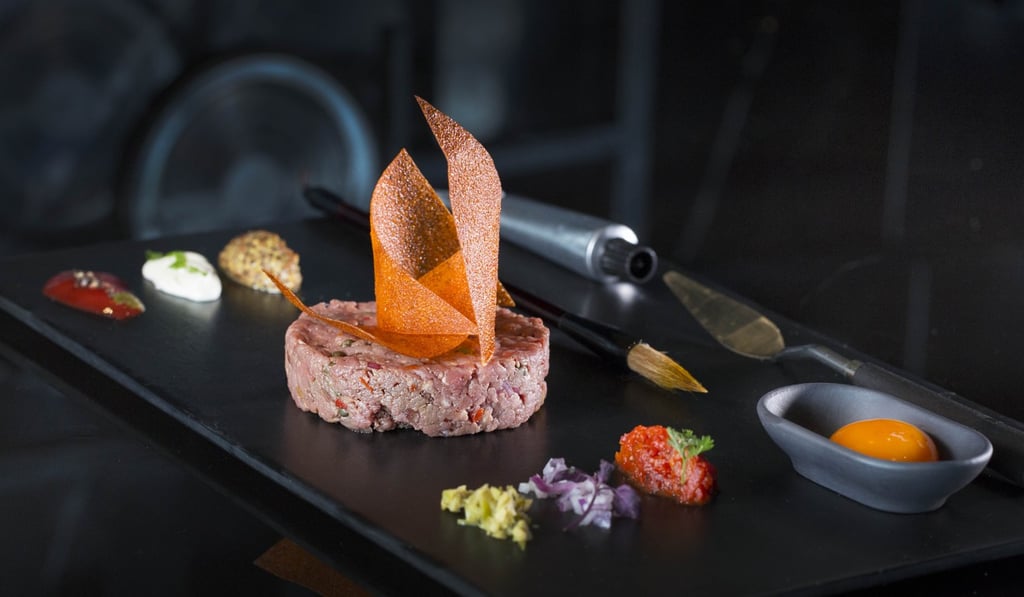 Aqua presents a steak tartare plated to resemble an artist’s paint palette during Art Basel Hong Kong 2018.