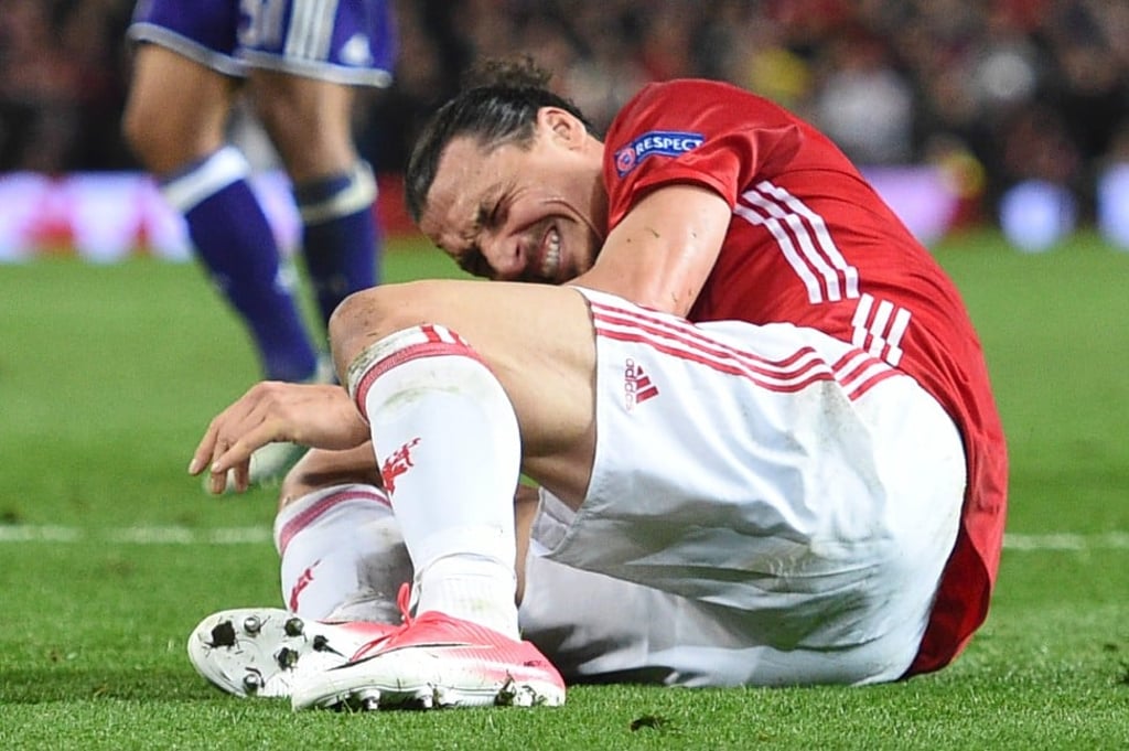Zlatan Ibrahimovic suffers a career-threatening knee injury after falling awkwardly against Anderlecht at Old Trafford in April 2017. Photo: AFP