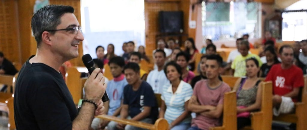 Father Luciano Felloni at a meeting of the Community Assisted Rehabilitation and Recovery of Outpatient Training System (Carrots), a programme that mixes psychology, counselling and spiritual guidance to get people off drugs. Photo: Carrots Father Luciano Felloni at a meeting of the Community Assisted Rehabilitation and Recovery of Outpatient Training System (Carrots), a programme that mixes psychology, counselling and spiritual guidance to get people off drugs. Photo: Carrots