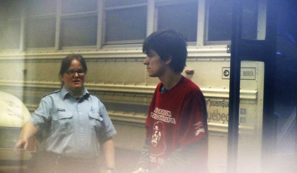 In this February 21, 2017 file photo shot through an obstruction, Alexandre Bissonnette arrives at the courthouse in Quebec City. Photo: The Canadian Press via AP