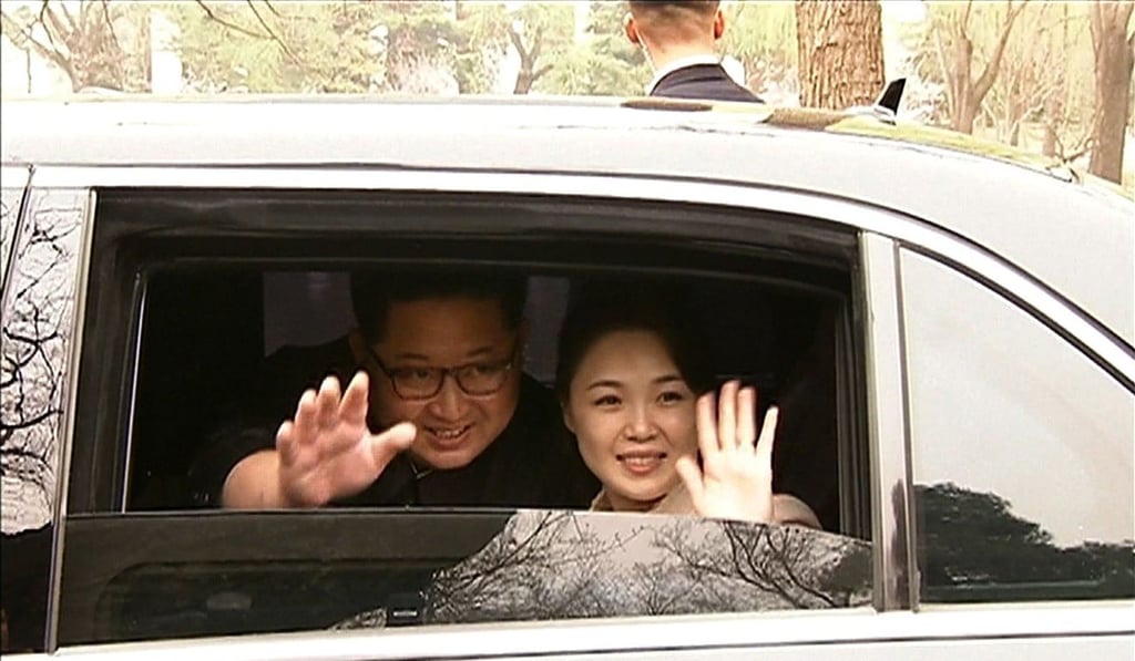North Korea's leader Kim Jong-un and his wife Ri Sol-juu wave goodbye as they depart by car following a meeting with China's President Xi Jinping in Beijing this week. Photo: AFP North Korea's leader Kim Jong-un and his wife Ri Sol-juu wave goodbye as they depart by car following a meeting with China's President Xi Jinping in Beijing this week. Photo: AFP
