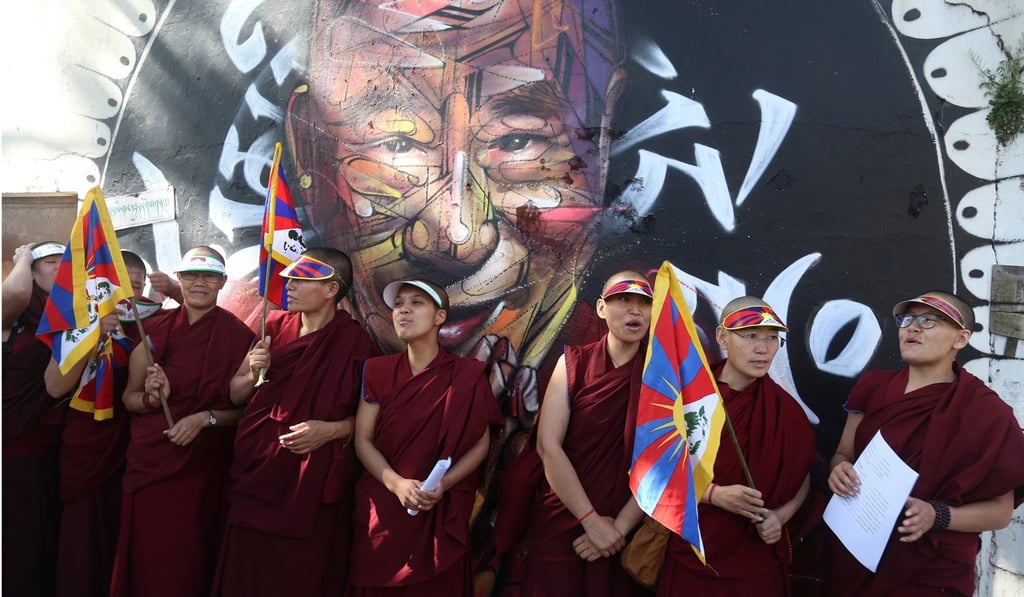 Tibetans living in exile in India attend a demonstration on March 12 in Dharamsala, India, to mark the 59th anniversary of the Tibetan uprising. India banned Tibetans from holding a rally in New Delhi to mark the anniversary, as it tries to improve fraught ties with China. Photo: EPA-EFE