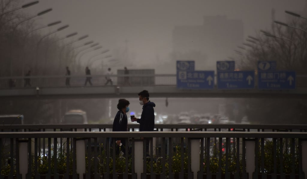 A sandstorm kicked up unusually high levels of dust in Beijing during Kim Jong-un’s visit. Photo: AFP