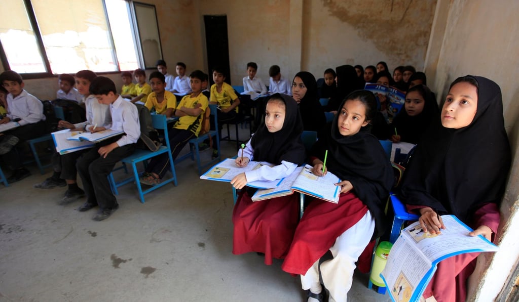 Children attend a class at Khushal school that Nobel Peace Prize laureate Malala Yousafzai used to attend. Photo: Reuters