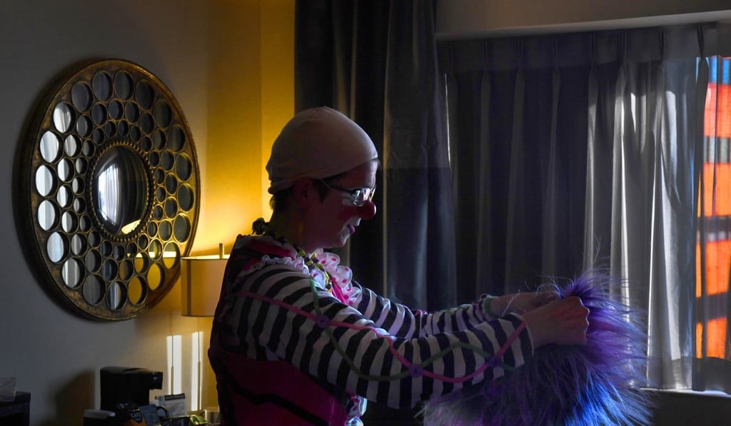 Former Ringling Bros. clown Tricia ‘Pricilla Mooseburger’ Manuel gets ready to don her wig before her World Clown Convention performance. Photo: Washington Post Former Ringling Bros. clown Tricia ‘Pricilla Mooseburger’ Manuel gets ready to don her wig before her World Clown Convention performance. Photo: Washington Post