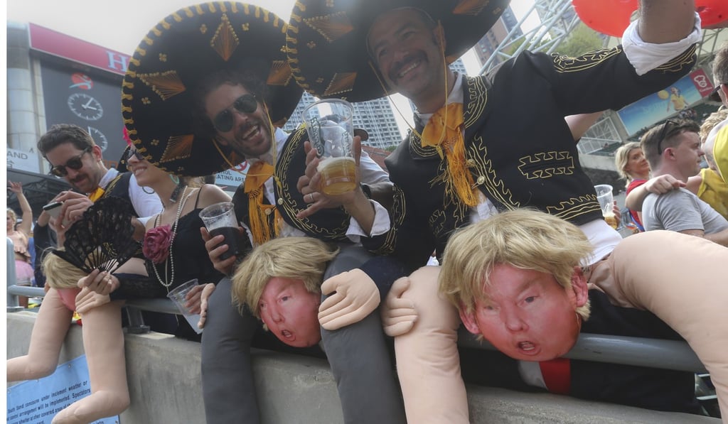 Donald Trump gives a couple of Mexicans a ride. Photo: K. Y. Cheng