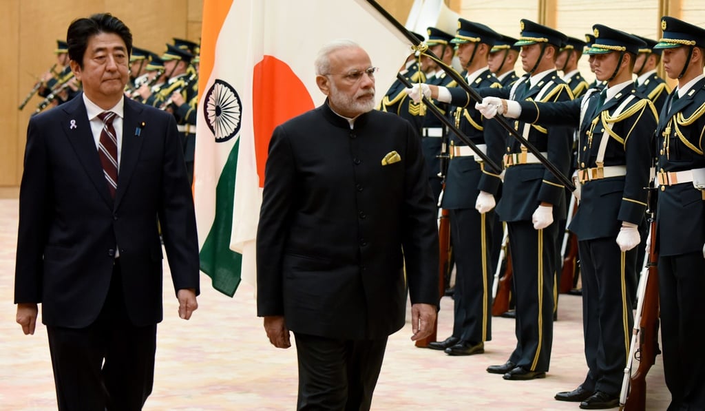 Japanese Prime Minister Shinzo Abe and his Indian counterpart Narendra Modi review an honour guard before their meeting at Abe's official residence in Tokyo in November 2016. Since last fall, the prospect of an Indo-Pacific alliance featuring India and Japan, plus Australia and the United States, to contain China has been discussed. Photo: AFP