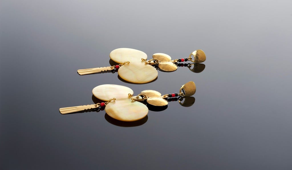 Earrings made from Mother of Pearl, black diamonds and red glass beads. Earrings made from Mother of Pearl, black diamonds and red glass beads.