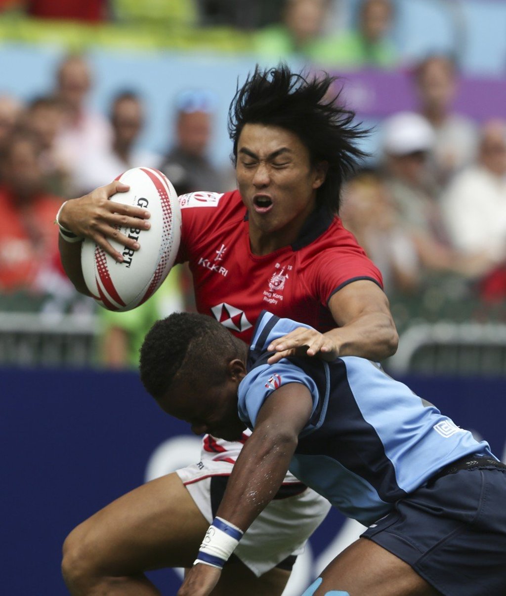 Cado Lee takes a hit at the 2017 Hong Kong Sevens. Photo: Jonathan Wong