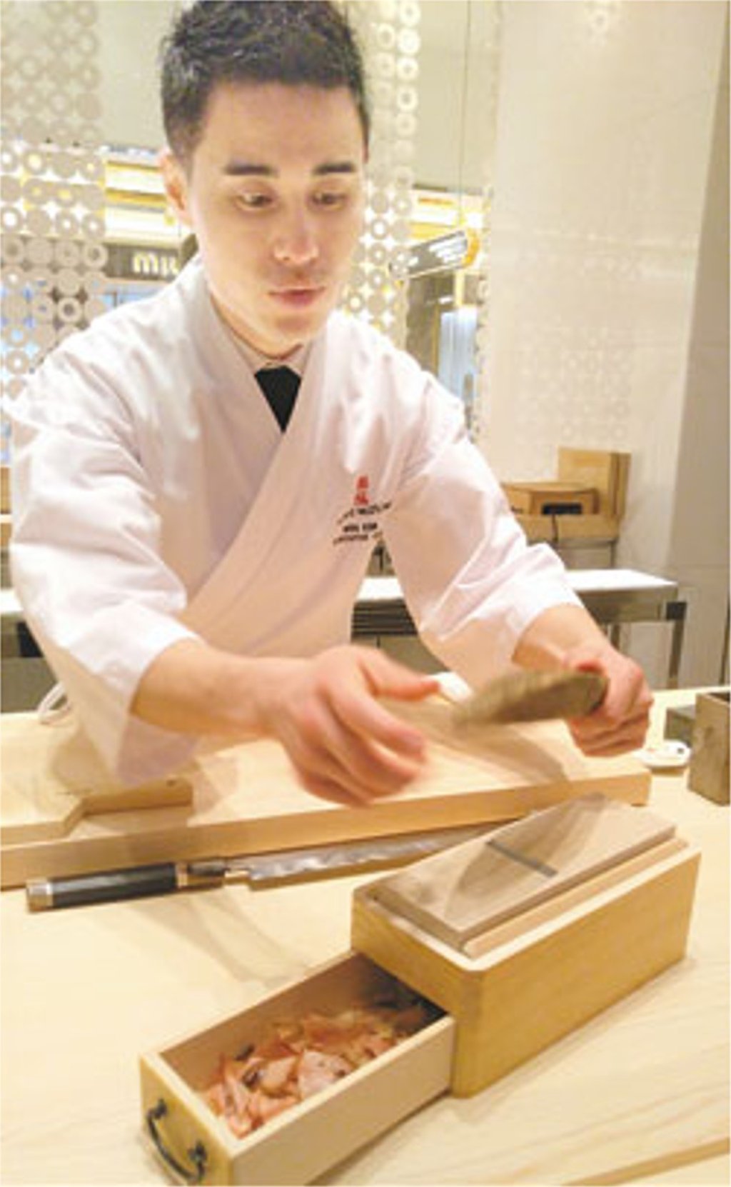 Executive chef Kim Min at Wynn Palace shows one of the ingredients used at his restaurant. Photo: Yun Suh-young Executive chef Kim Min at Wynn Palace shows one of the ingredients used at his restaurant. Photo: Yun Suh-young