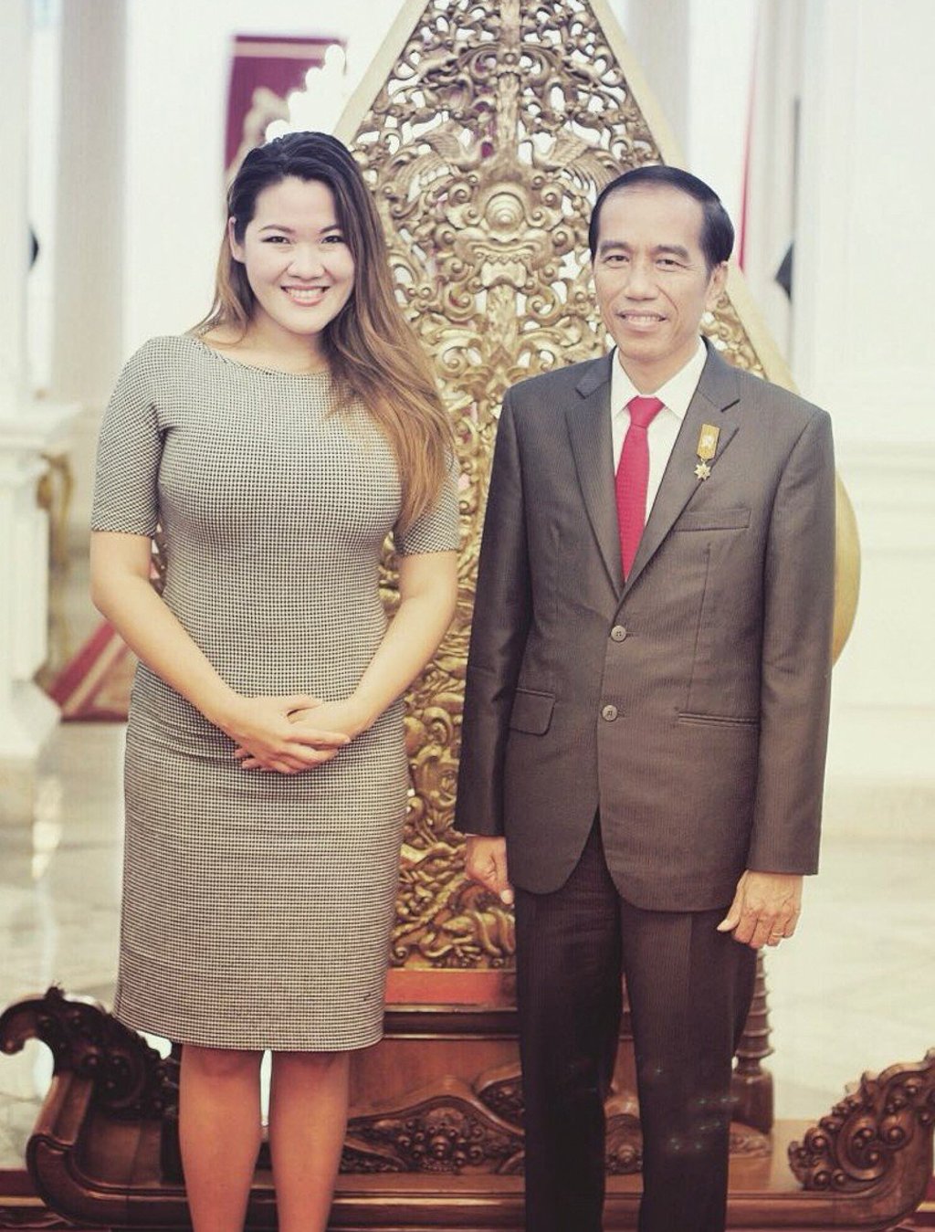 Victoria Lee with President Joko Jokowi Widodo in 2016. Lee was born in Indonesia after her parents migrated there in the 1970s.