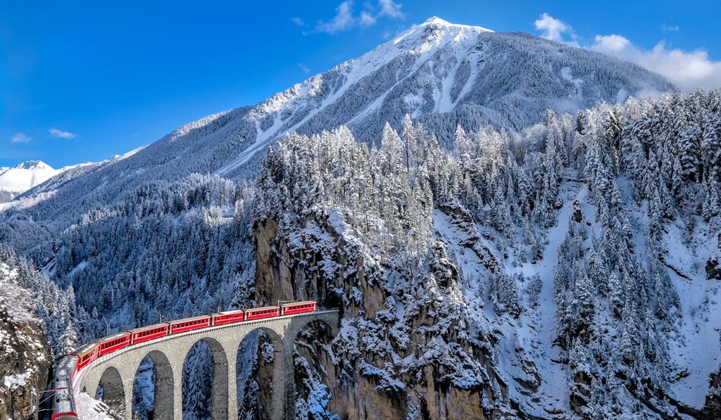 The Glacier Express train in Switzerland. The Glacier Express train in Switzerland.