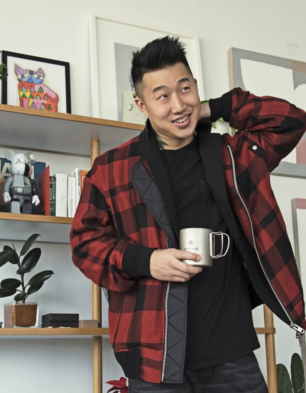 Maeland wears a plaid jacket by Sacai. Photo: Kara Chung