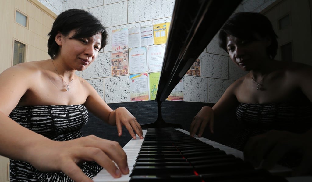 Kay Cheung plays the piano in To Kwa Wan. She went to study in the Netherlands despite never having been there before. Photo: Dickson Lee