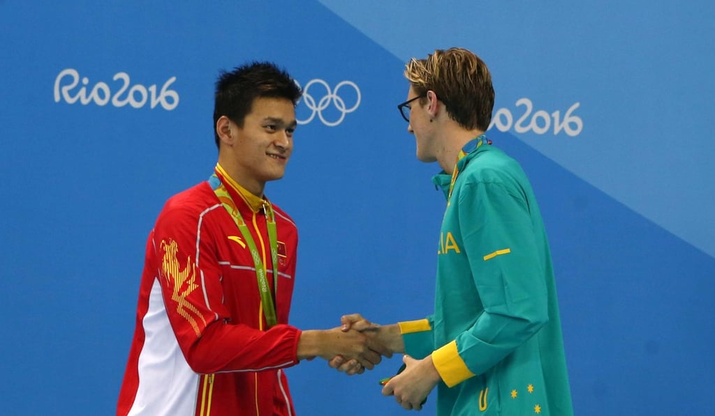 Mack Horton of Australia shakes hands with Sun Yang in Rio. Photo: Reuters