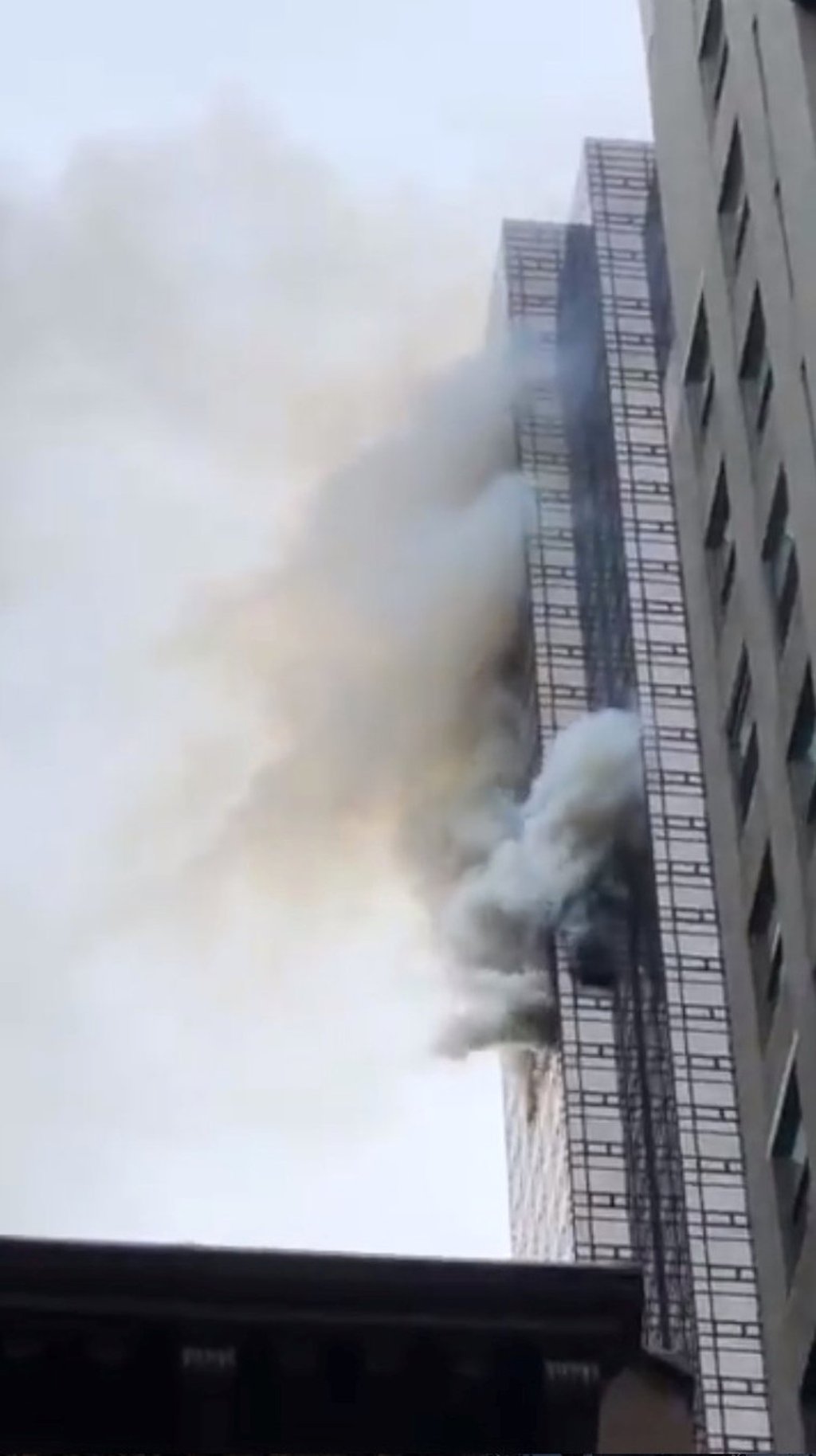Smoke rises up from Trump Tower in New York. Photo: Reuters