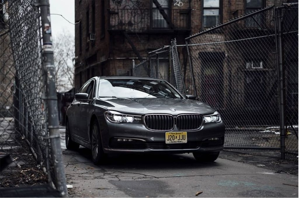 The hybrid uses a plug-in outlet toward the front of the car. It can go 14 miles (22 km) on electric-only power. Photo: Cesar Soto/Bloomberg