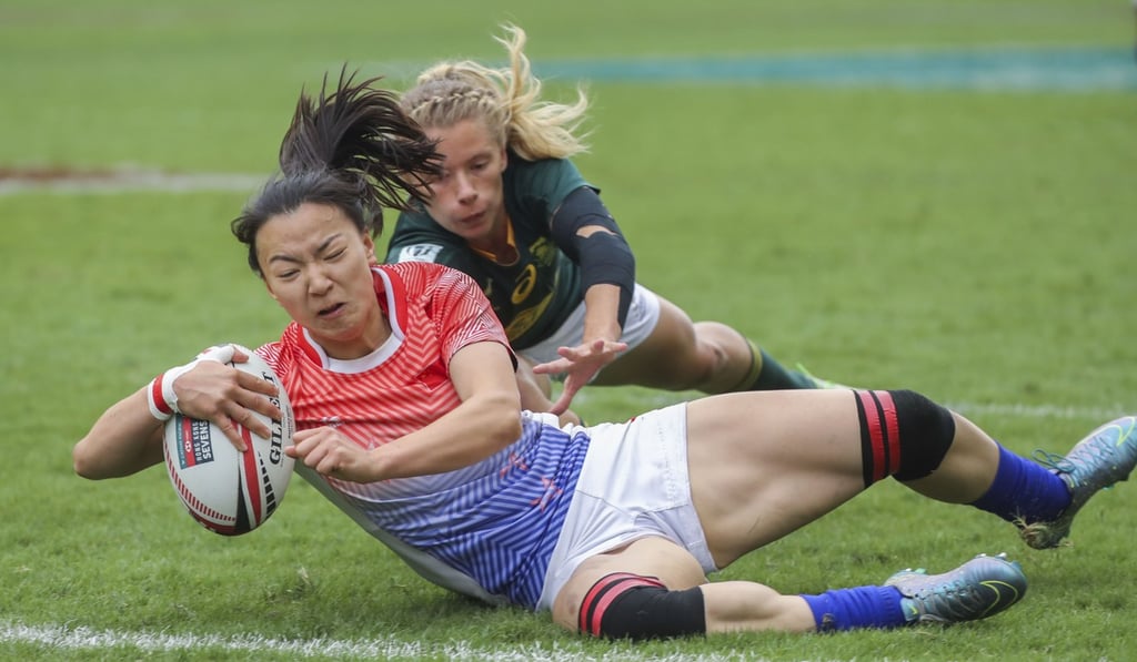China's Chen Keyi (front) scores against South Africa in the World Series Qualifier final. Photo: Winson Wong
