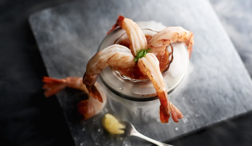 A jumbo shrimp cocktail makes a dramatic entrance at Morton's of Chicago’s in Hong Kong.