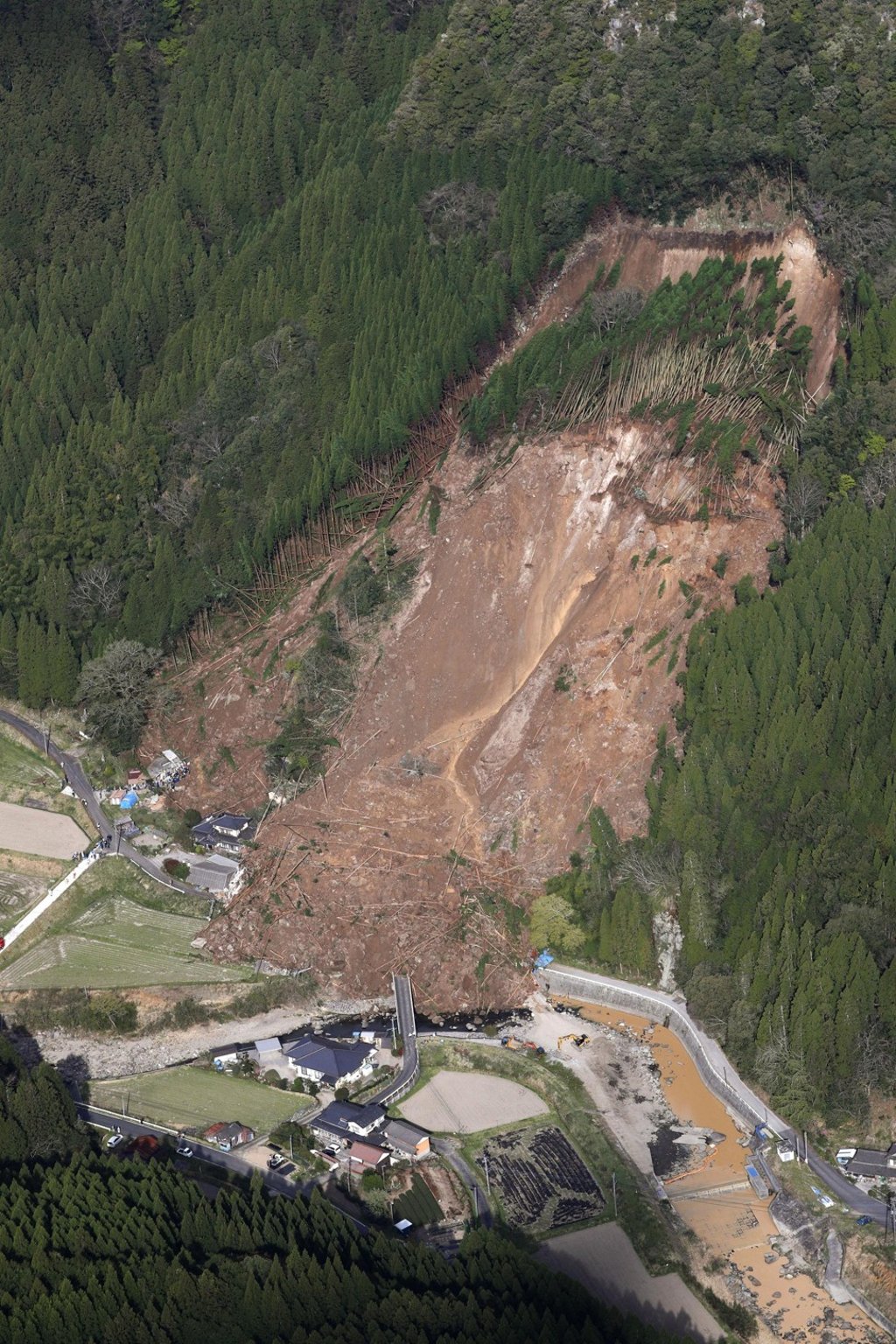 The site of the landslide. Photo: Kyodo The site of the landslide. Photo: Kyodo