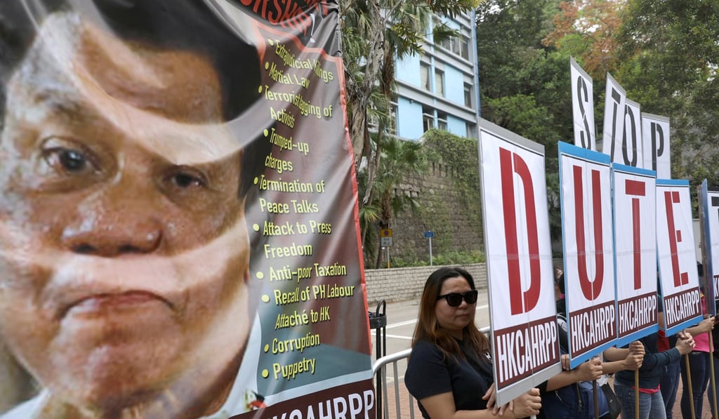 Filipino and migrant worker groups protest in Tsim Sha Tsui. Photo: Sam Tsang