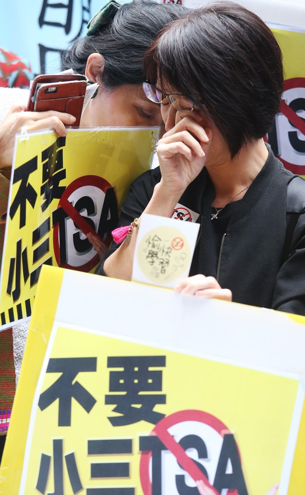 A member of a parents’ concern group weeps at an anti-TSA (Territory-wide System Assessment) protest in Wan Chai last April. Photo: David Wong