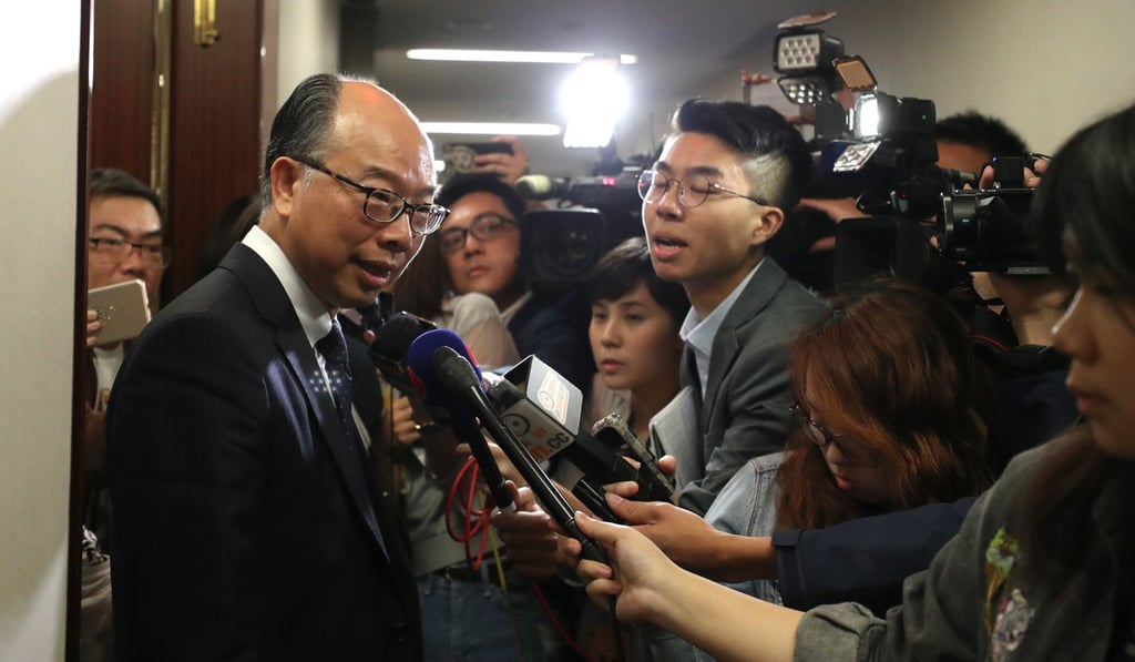 Transport minister Frank Chan talks to the press at the Legislative Council. Photo: Winson Wong Transport minister Frank Chan talks to the press at the Legislative Council. Photo: Winson Wong
