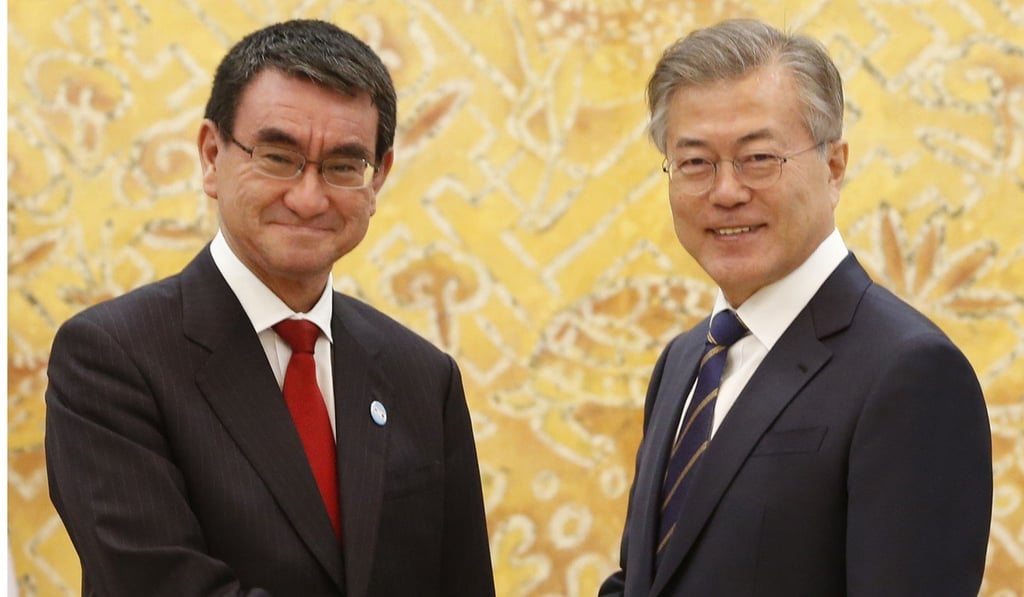 Japanese Foreign Minister Taro Kono meets South Korean President Moon Jae-in. Photo: AP