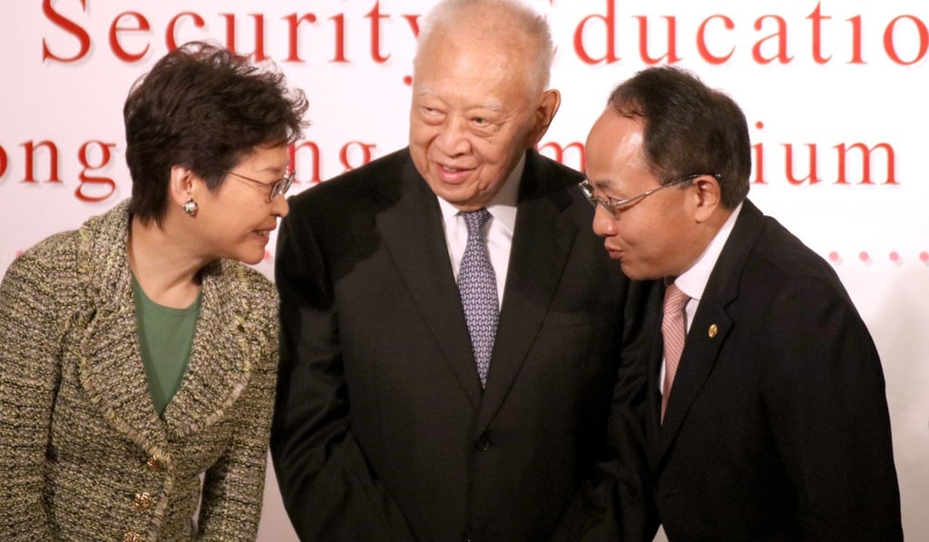 (From left ) Hong Kong Chief Executive Carrie Lam Cheng Yuet-ngor, former city leader Tung Chee-hwa, and liaison office director Wang Zhimin. Photo: Felix Wong