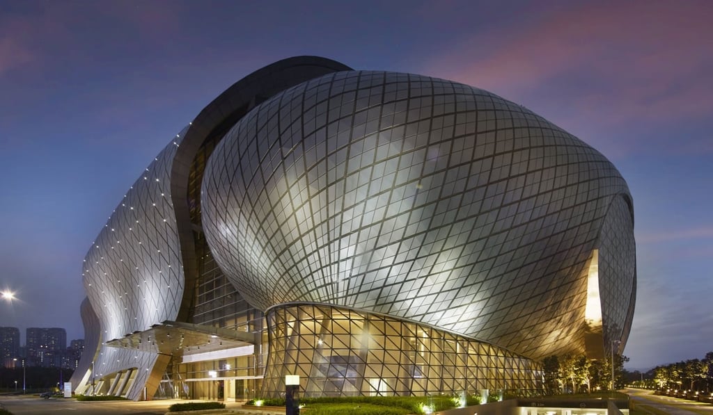 The futuristic Malaysia International Trade and Exhibition Centre in Kuala Lumpur is shaped to evoke the seed of a rubber tree, which played a historic role in the development of the Malaysian economy.