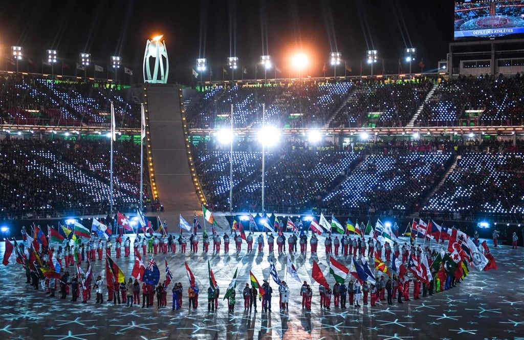 Flagbearers arrive during the closing ceremony of the Pyeongchang 2018 Winter Olympic Games at the Pyeongchang Stadium. Photo: AFP