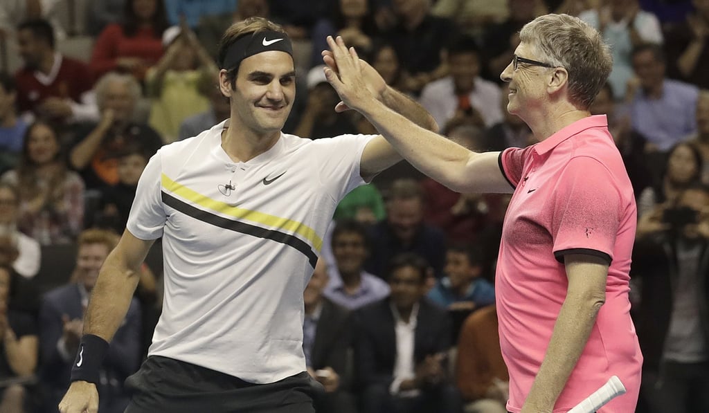 Bill Gates plays an exhibition tennis match in San Jose, California, partnering Roger Federer, on March 5. A decade ago, when Microsoft was attacked for its monopolistic practices, Gates was portrayed as evil incarnate. Today, he is known more for his philanthropy. Photo: AP