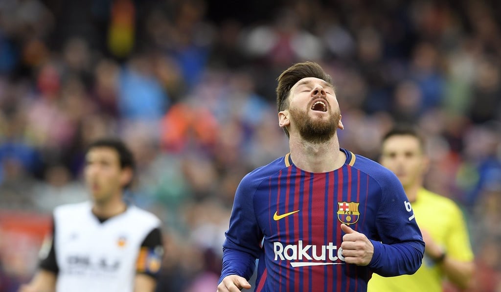 Lionel Messi in action against Valencia. Photo: AFP Lionel Messi in action against Valencia. Photo: AFP