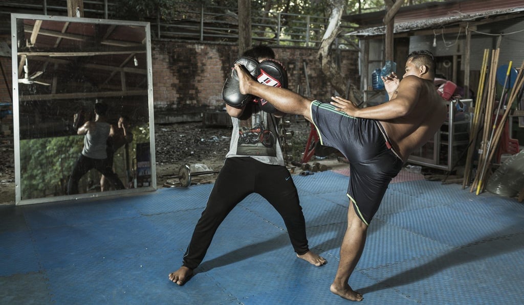 Students practising bokator at San Kim Sean’s academy. Photo: Enric Catala