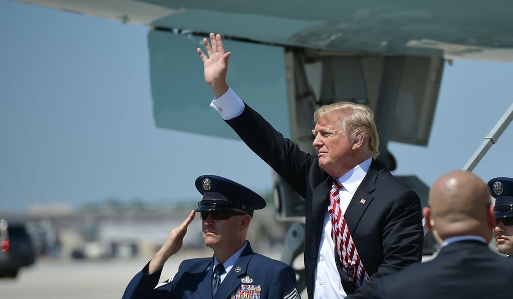 US President Donald Trump steps off Air Force One on Monday. He is reportedly ‘uncomfortable’ on placing the sanctions on Russia unless another chemical attack was to occur. Photo: AFP US President Donald Trump steps off Air Force One on Monday. He is reportedly ‘uncomfortable’ on placing the sanctions on Russia unless another chemical attack was to occur. Photo: AFP